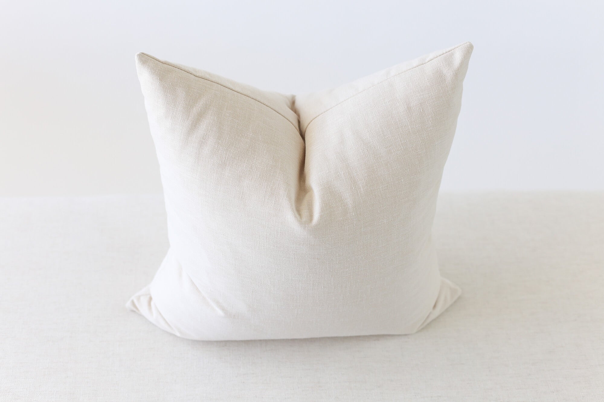 https://www.laurelandblush.com/cdn/shop/products/neutral-linen-pillow-cover-laurel-and-blush-7_2048x.jpg?v=1660252502